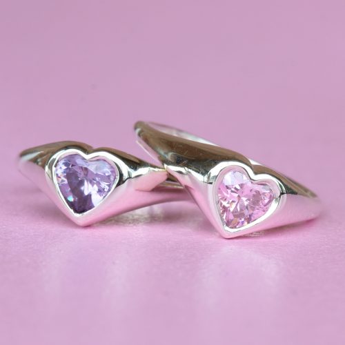silver heart signet rings with purple and pink stones.