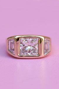yellow gold engagement ring with 3ct princess cut lab grown diamond and trapezoid diamonds